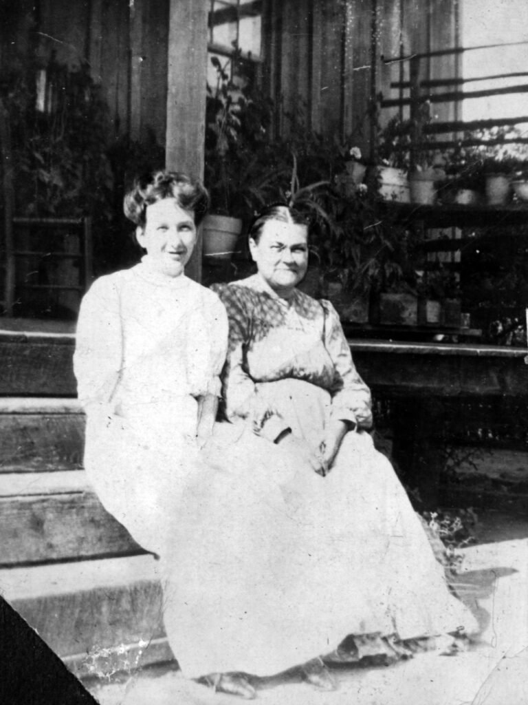 Daisy (Wilson) Richardson and Emily (Bowdoin) Richardson. One of only two photos we have of Emily, both taken at the same time (about 1907), at John and Emily's home in Deatsville, kept in Daisy's photo album.