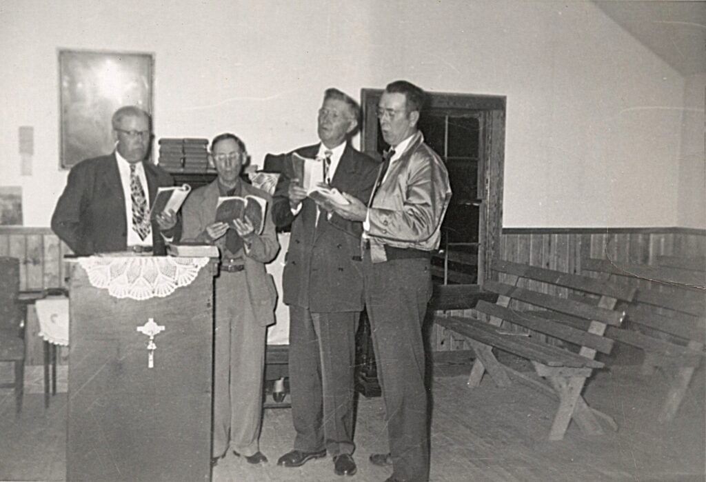 Walter Aldridge singing in a Gospel quartet at Neel Methodist Church.
(Left to right) (unknown), Elvie Roberts, Walter Aldridge, Clifton Long.