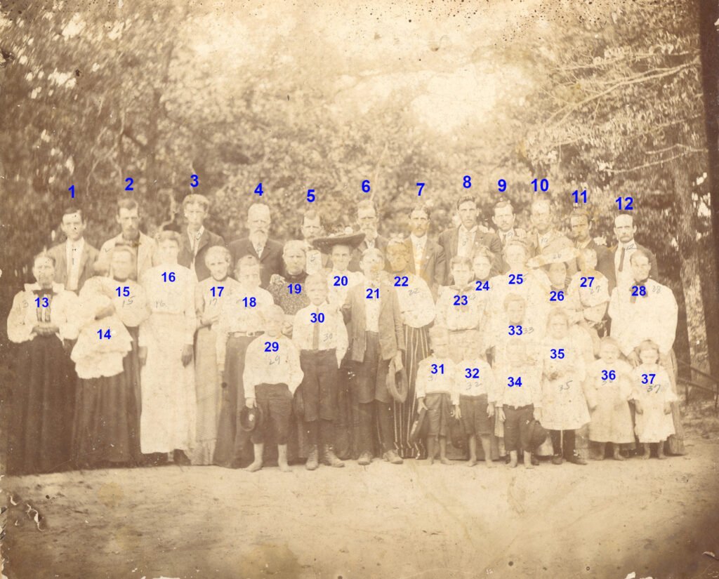 Reunion photo of the James Council Cook family, about 1905, shortly after his death. One of the treasures of the Cook family, surviving only in this badly damaged print.